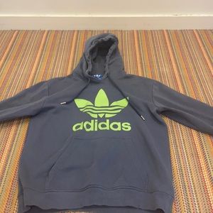 it’s a size medium adidas it’s worn and cool